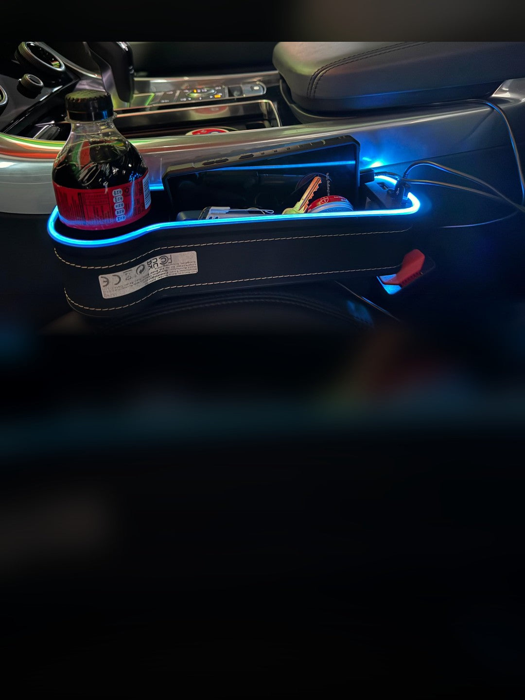 The Gap Keeper Pro glowing blue beside the seat