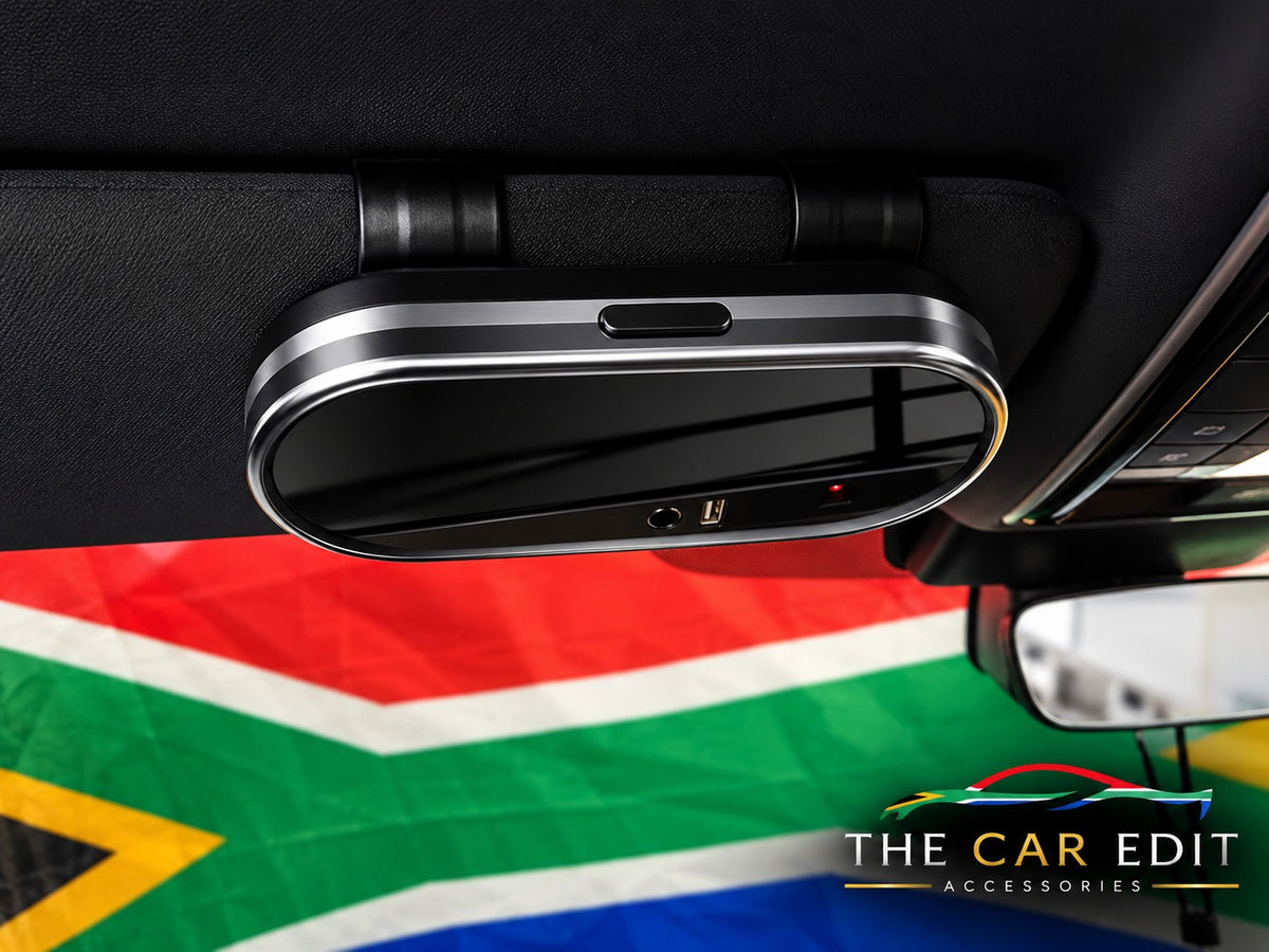 The Chrome Case in Black & Silver clipped to a car sun visor