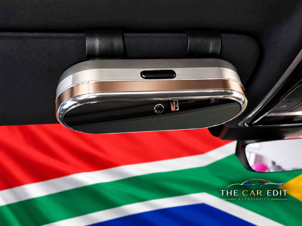 The Chrome Case in Silver & Gold clipped to a car sun visor