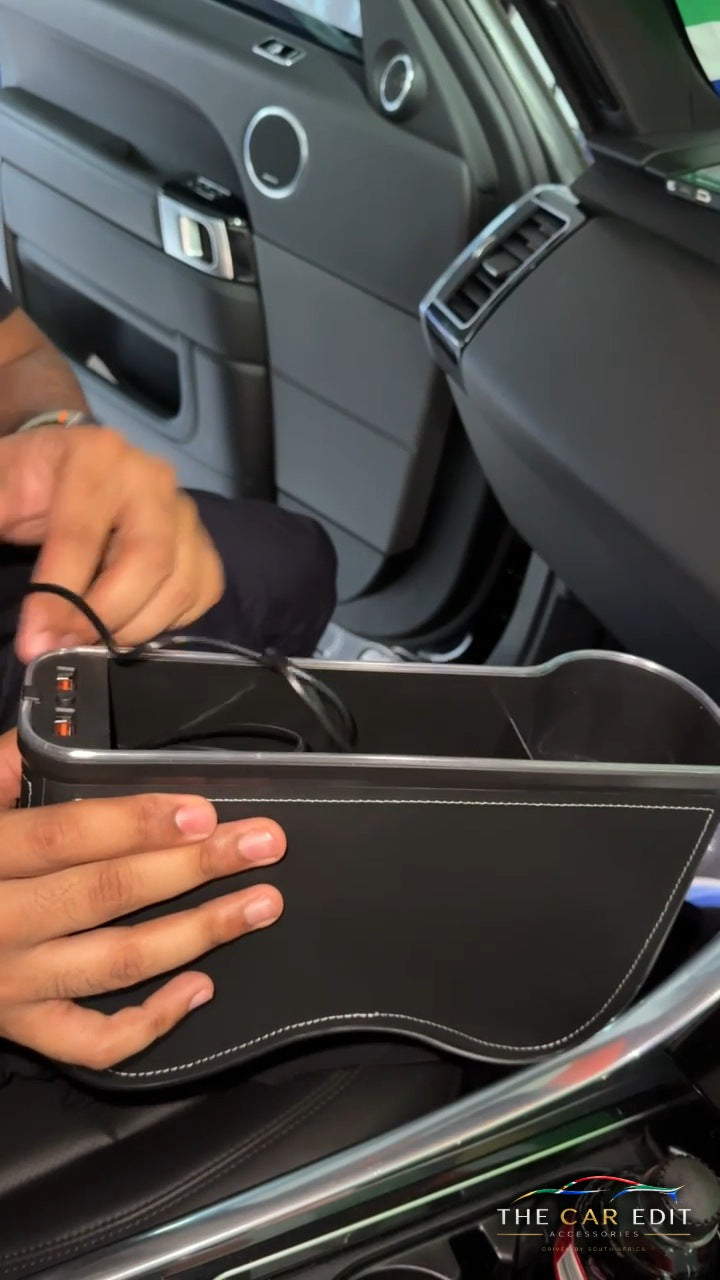Fitting The Gap Keeper Pro beside the seat, showing the stitched leather side panel