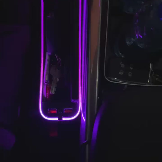 Video of The Gap Keeper Pro glowing beside the seat at night