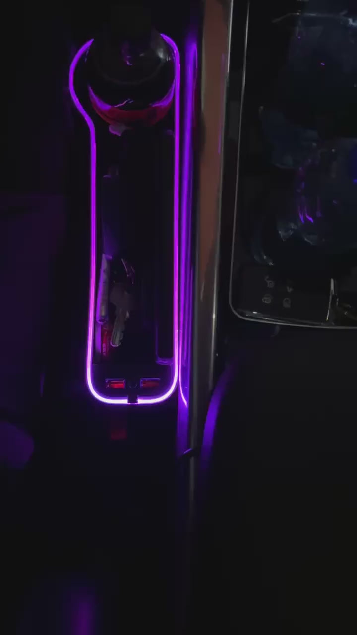 Video of The Gap Keeper Pro glowing beside the seat at night