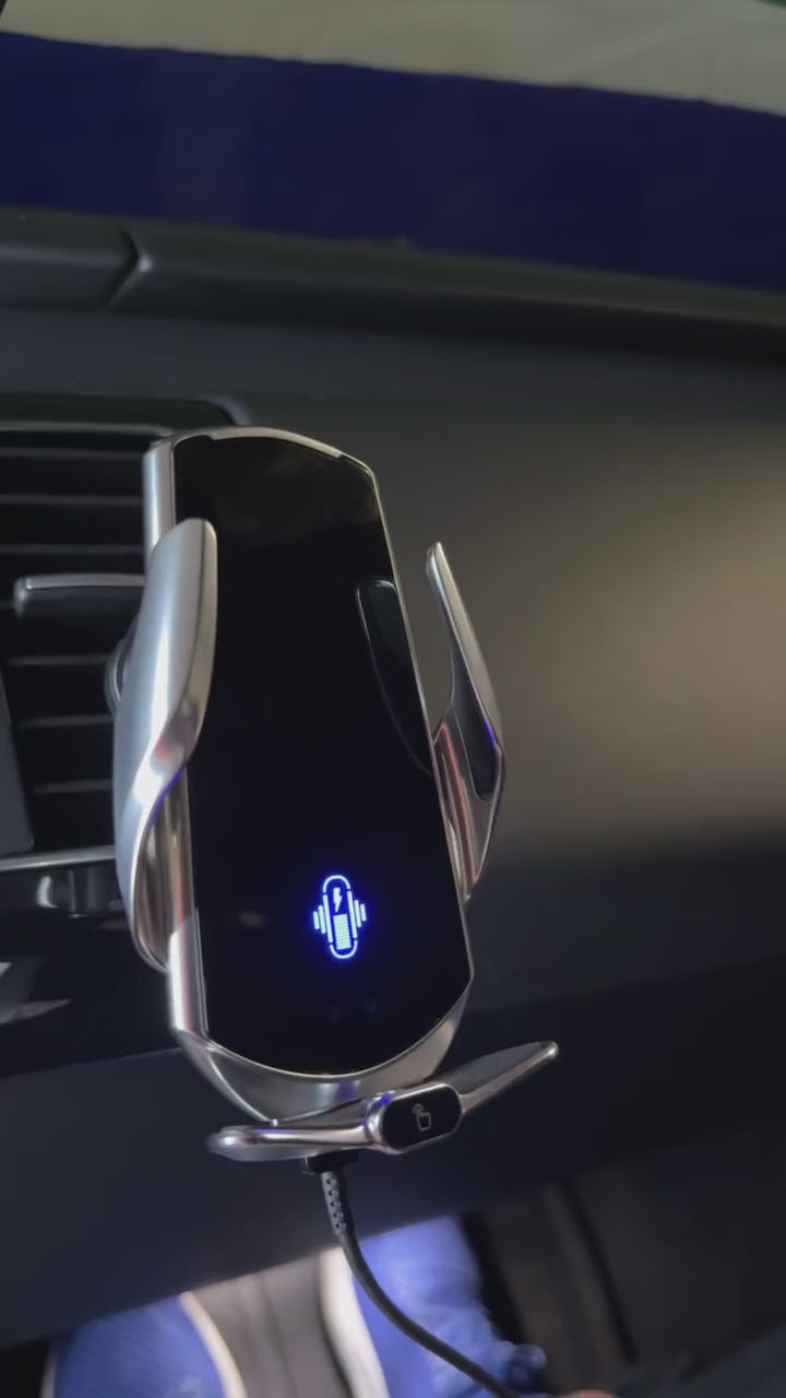 Video of the GripBot auto-clamp wireless charging mount on a car air vent